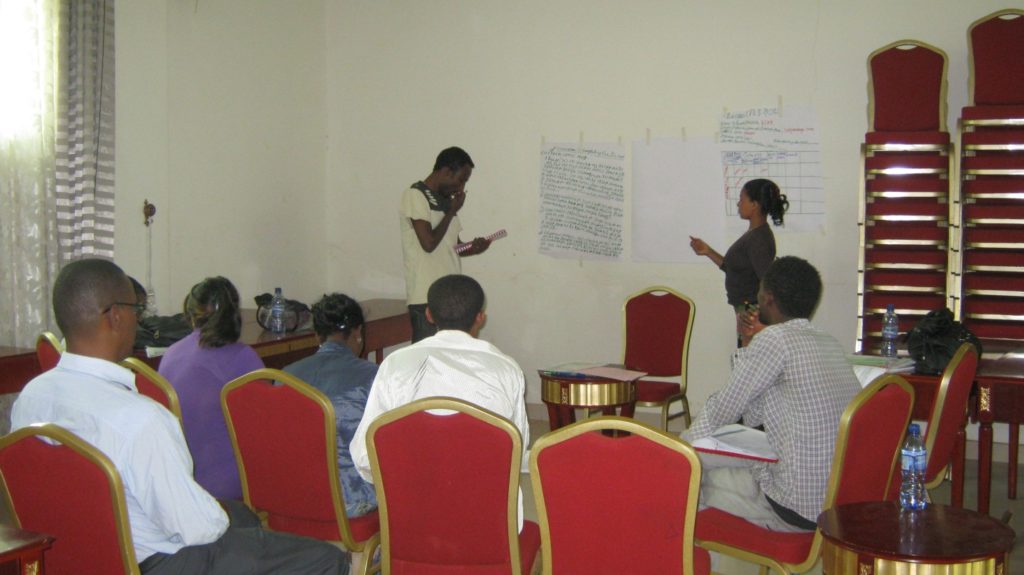 A learning session in Ethiopia takes place at a monthly meeting
