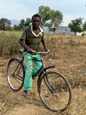 young man on bicycle